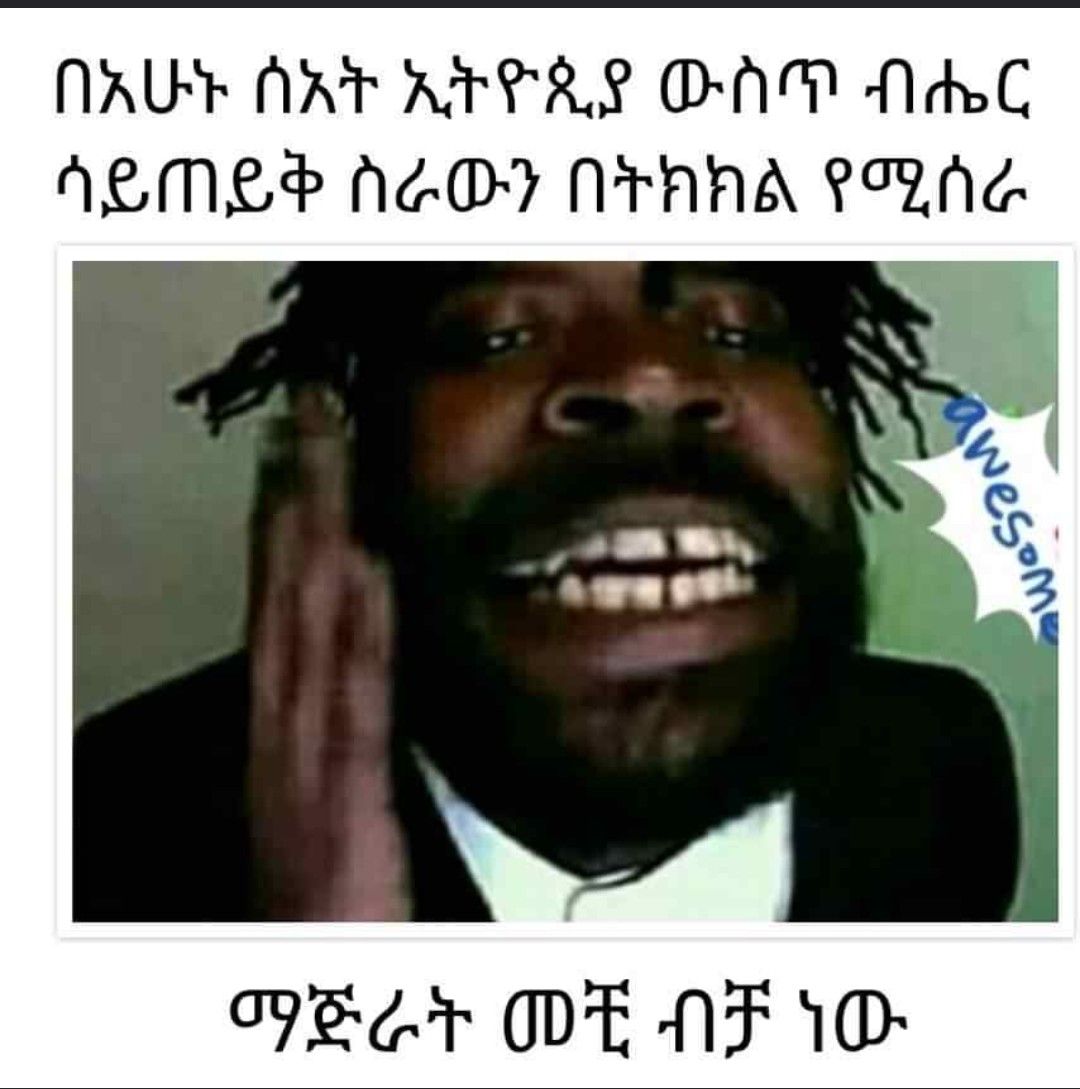 a photo of a man with dread hair and a star on his forehead